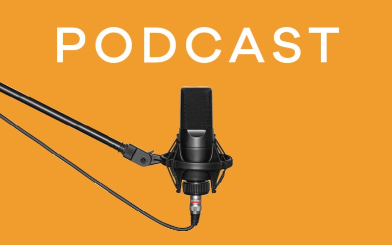 Podcast microphone on orange background